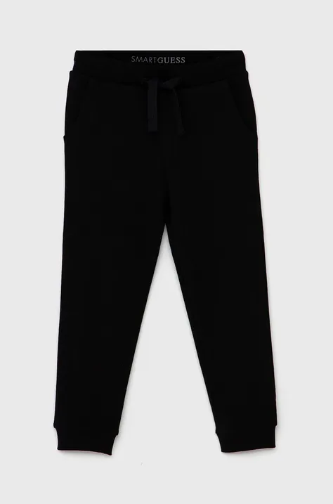 Дитячі штани Guess колір чорний гладке