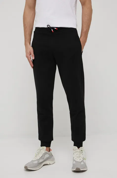 Бавовняні спортивні штани Rossignol чоловічі колір чорний однотонні
