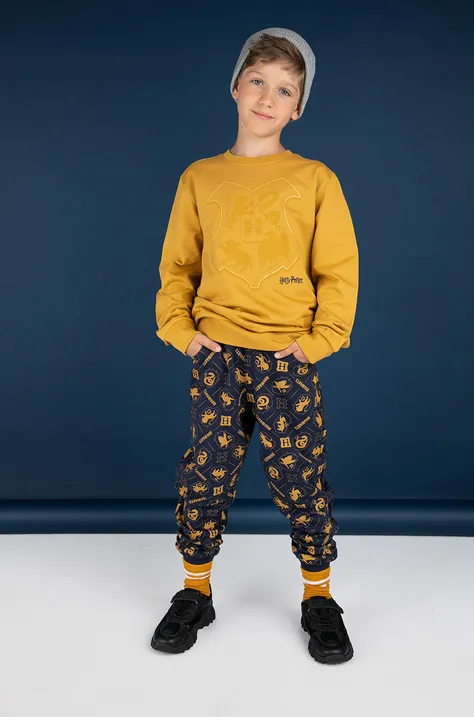 Coccodrillo spodnie dresowe bawełniane dziecięce kolor granatowy wzorzyste