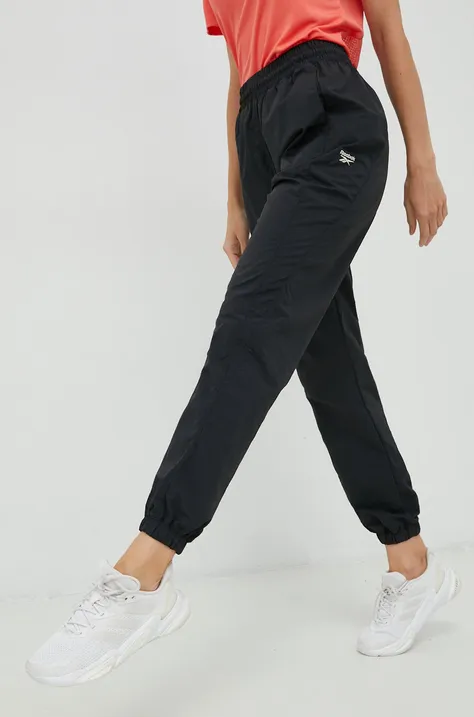 Спортивные штаны Reebok Classic женские цвет чёрный однотонные