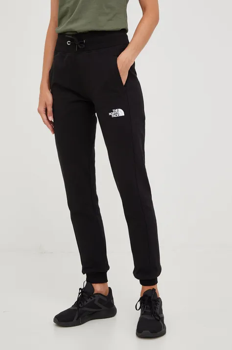 Бавовняні спортивні штани The North Face жіночі колір чорний однотонні