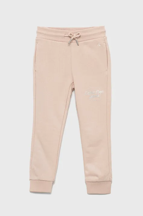 Calvin Klein Jeans spodnie dresowe bawełniane dziecięce IG0IG01602.9BYY kolor różowy z nadrukiem