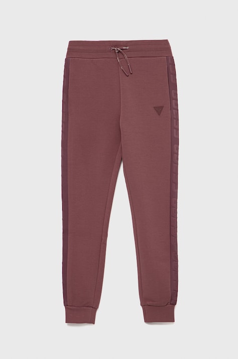 Dětské tepláky Guess růžová barva, hladké