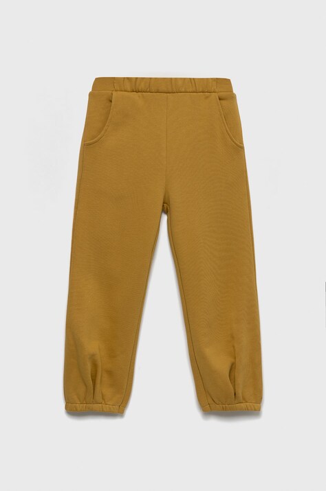 Dětské bavlněné tepláky United Colors of Benetton žlutá barva