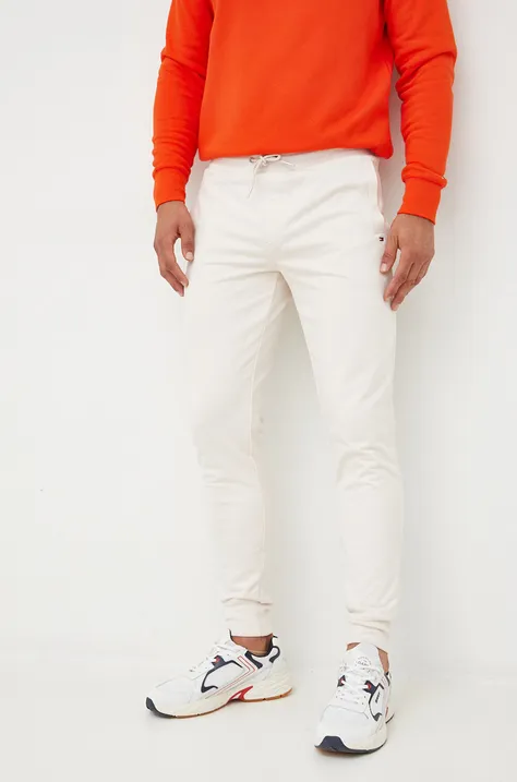 Tommy Hilfiger spodnie dresowe męskie kolor beżowy gładkie