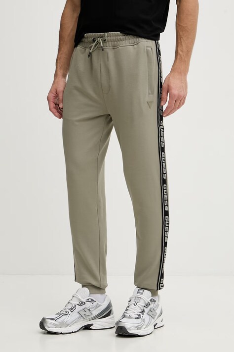 Guess spodnie dresowe kolor zielony z nadrukiem