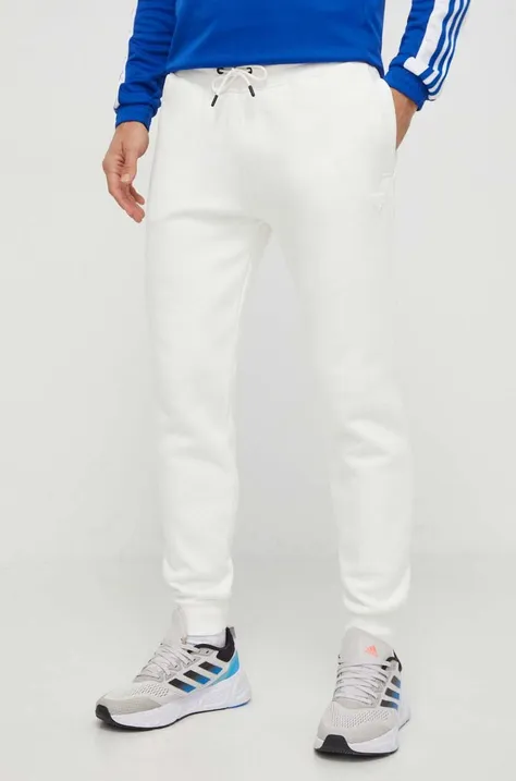 Guess spodnie dresowe kolor biały melanżowe