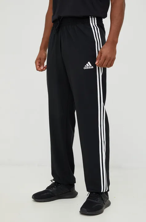 Штани для тренувань adidas чоловічі колір чорний однотонні