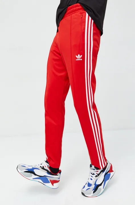 Spodnji del trenirke adidas Originals moški, rdeča barva
