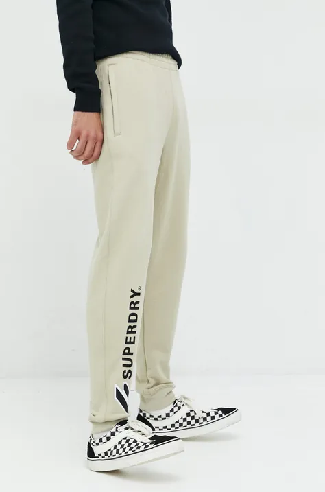 Superdry pantaloni de trening din bumbac barbati, culoarea bej, cu imprimeu