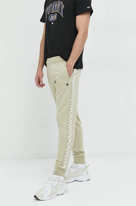 Superdry spodnie dresowe męskie kolor beżowy z aplikacją