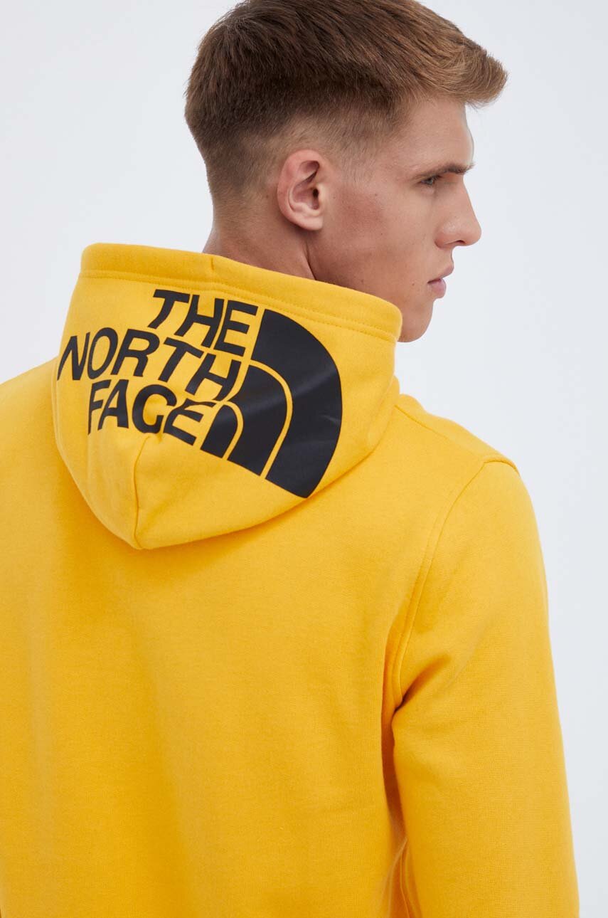 The North Face bluza bawełniana męska kolor żółty z kapturem gładka