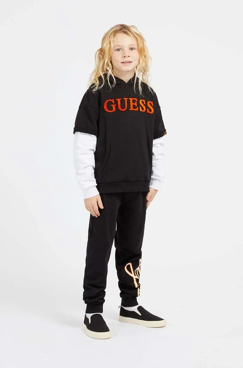 Παιδική βαμβακερή μπλούζα Guess χρώμα: μαύρο, με κουκούλα