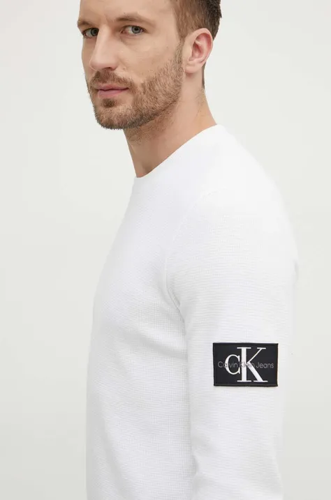 Памучен суичър Calvin Klein Jeans в бежово с апликация