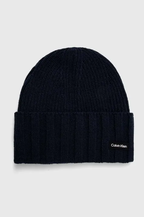Vlnená čiapka Calvin Klein tmavomodrá farba, z tenkej pleteniny, vlnená