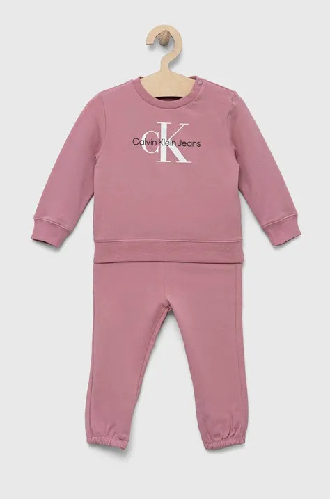 Otroška trenirka Calvin Klein Jeans roza barva