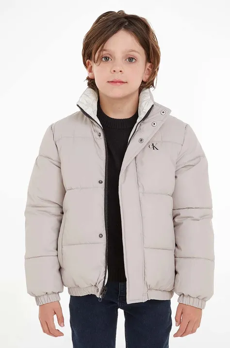 Otroška dvostranska jakna Calvin Klein Jeans siva barva