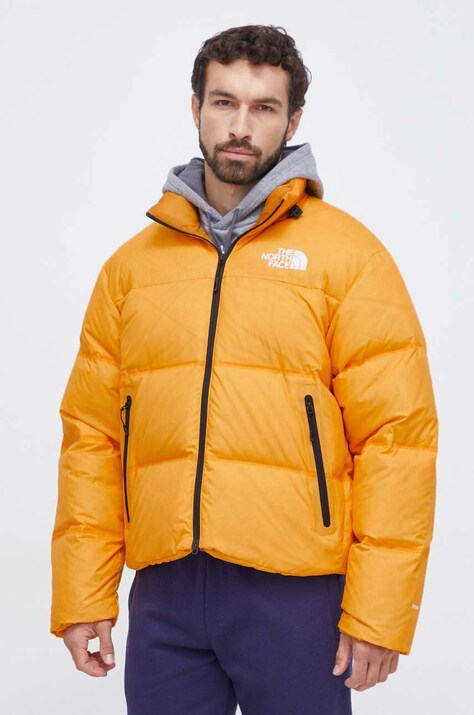 The North Face geaca de puf barbati, culoarea galben, de iarna