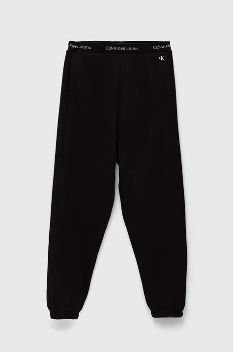 Calvin Klein Jeans pantaloni de trening pentru copii culoarea negru, neted