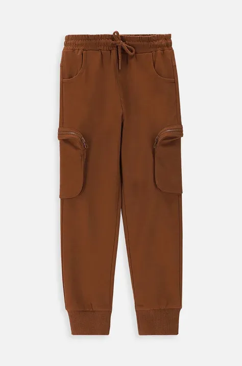 Coccodrillo spodnie dresowe bawełniane dziecięce kolor brązowy gładkie