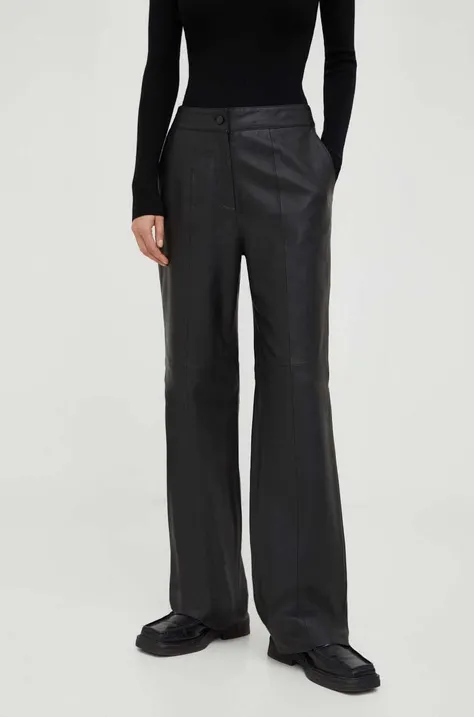 Kožne hlače Bruuns Bazaar za žene, boja: crna, široke, visoki struk