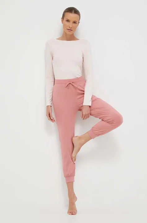 Roxy spodnie do jogi Naturally Active kolor różowy gładkie
