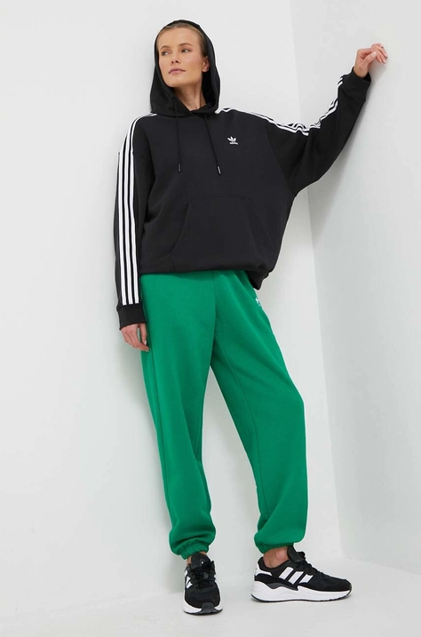 Tepláky adidas Originals zelená farba, jednofarebné