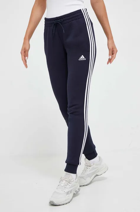 Bavlnené tepláky adidas tmavomodrá farba, s nášivkou,  IC9923