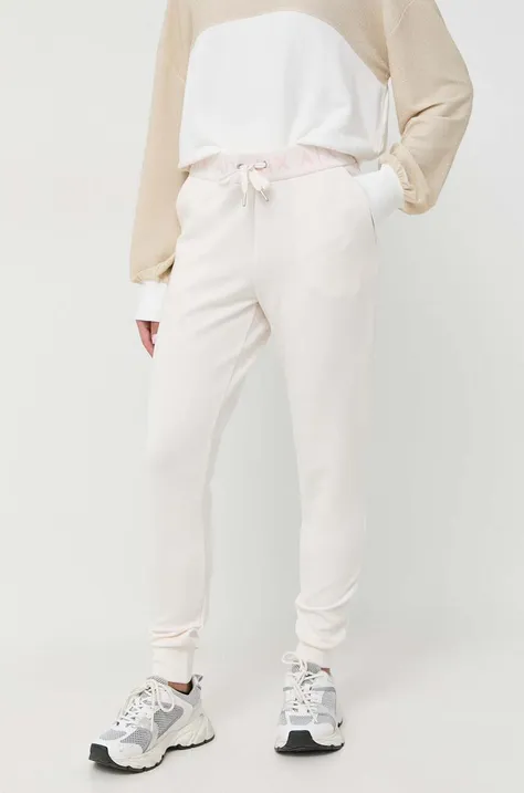 Спортивні штани Armani Exchange колір бежевий з принтом