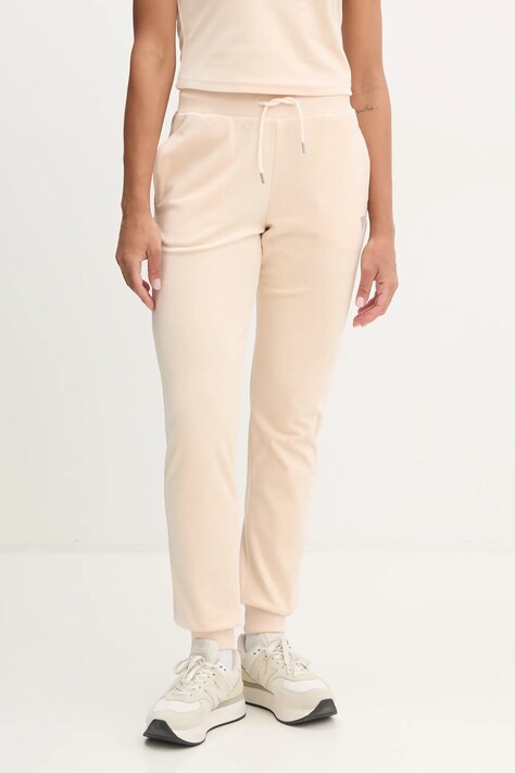 Спортивные штаны Guess цвет бежевый с аппликацией