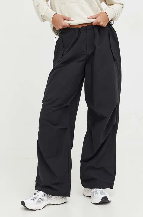 Nohavice Tommy Jeans dámske, čierna farba, široké, stredne vysoký pás