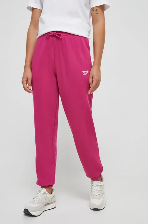 Reebok spodnie dresowe kolor różowy gładkie