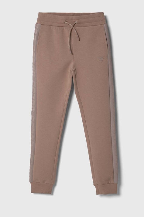 Dětské tepláky Guess růžová barva, hladké