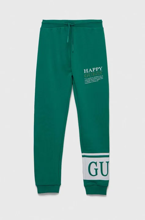 Guess spodnie dresowe bawełniane dziecięce kolor zielony z nadrukiem