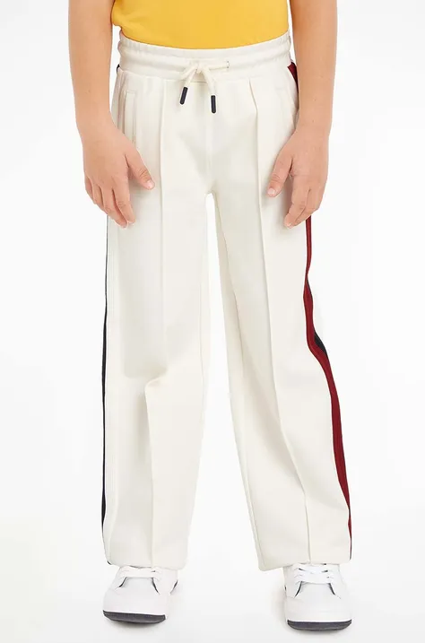 Дитячі спортивні штани Tommy Hilfiger колір білий візерунок