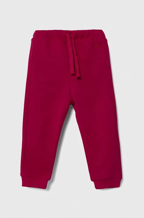 Детски памучен спортен панталон United Colors of Benetton в розово с изчистен дизайн