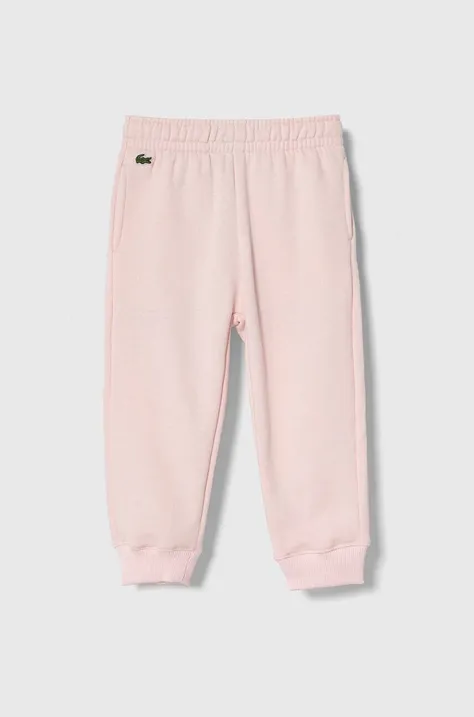 Lacoste spodnie dresowe dziecięce kolor różowy gładkie
