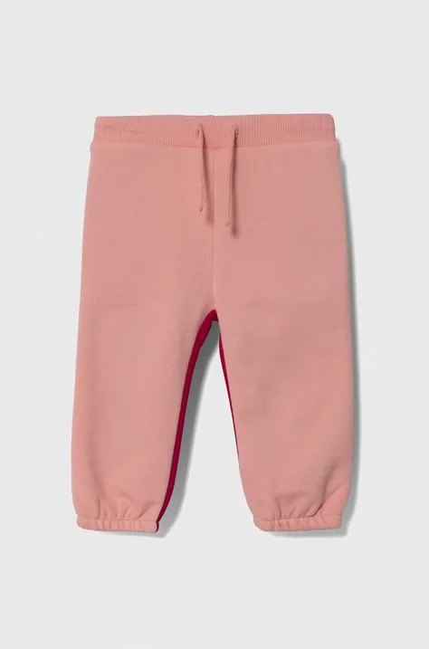 Дитячі спортивні штани United Colors of Benetton колір рожевий візерунок