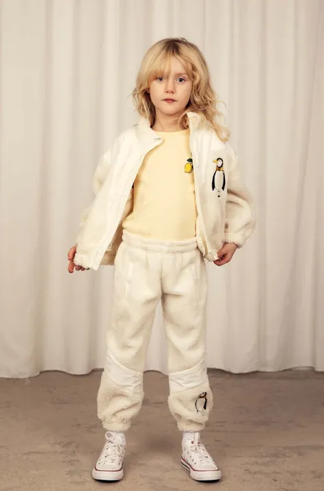 Детские спортивные штаны Mini Rodini цвет бежевый с аппликацией