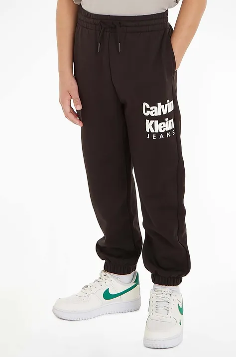 Детские спортивные штаны Calvin Klein Jeans цвет чёрный с принтом