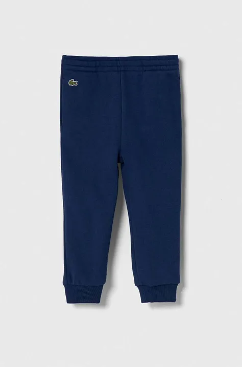 Детски памучен спортен панталон Lacoste в синьо с апликация