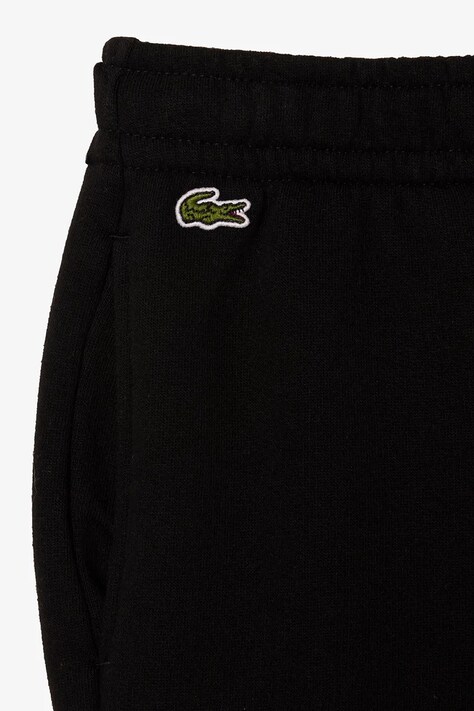 Lacoste spodnie dresowe dziecięce kolor czarny melanżowe XJ9728