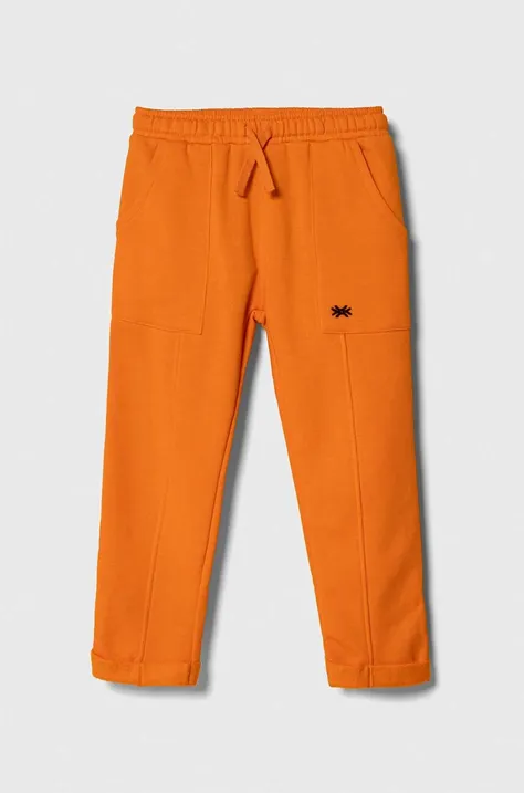 United Colors of Benetton spodnie dresowe dziecięce kolor pomarańczowy gładkie