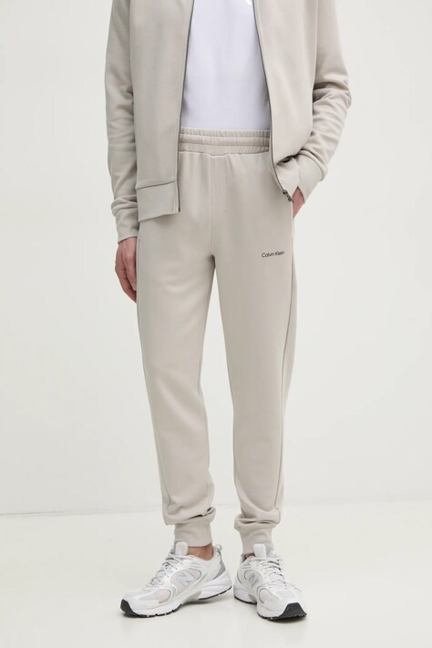 Calvin Klein pantaloni de trening culoarea bej, neted