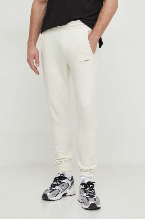 Calvin Klein pantaloni de trening culoarea bej, neted