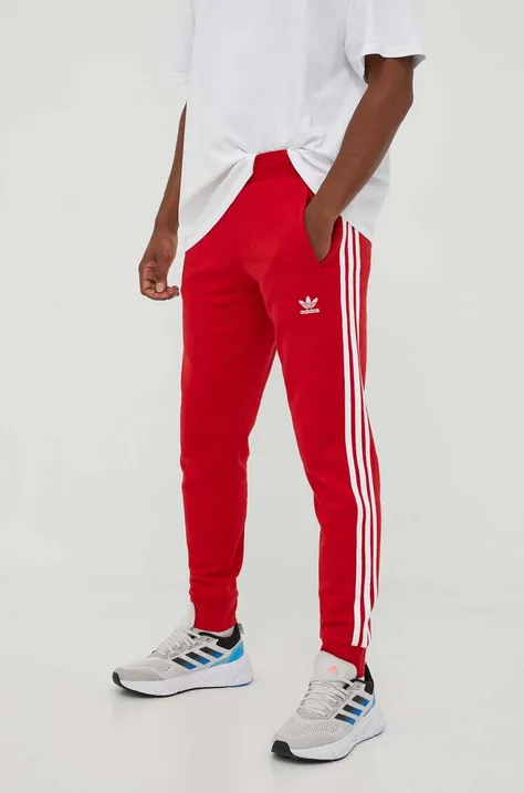 Tepláky adidas Originals červená farba, s nášivkou
