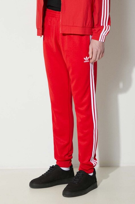 Спортивные штаны adidas Originals цвет красный с аппликацией