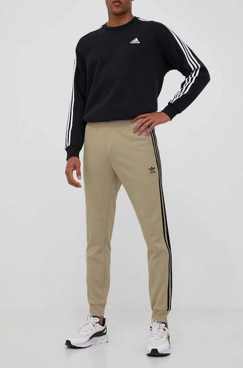 Spodnji del trenirke adidas Originals bež barva