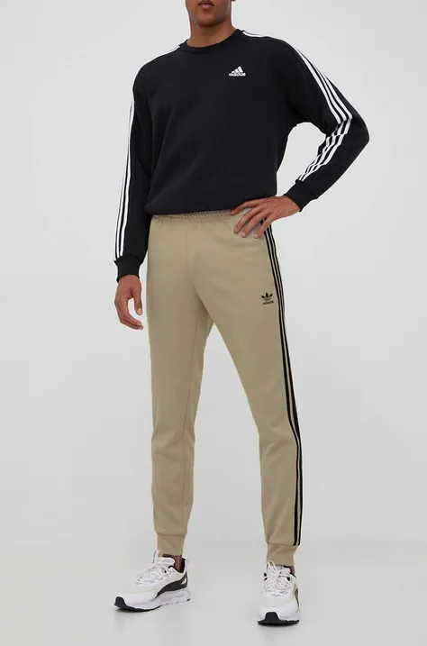 adidas Originals spodnie dresowe kolor beżowy z aplikacją