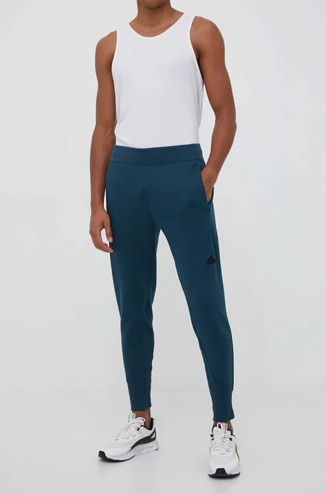 Спортен панталон adidas Z.N.E в синьо с изчистен дизайн